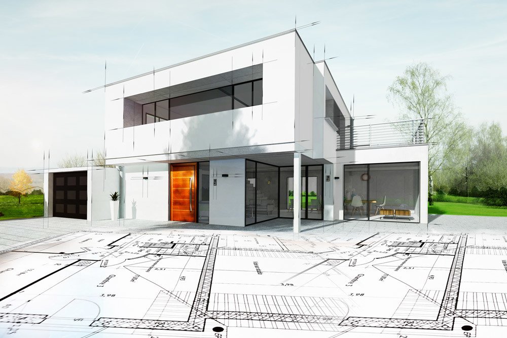 Designer reviewing home construction blueprints