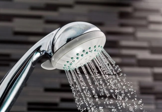 Professional contractor installing custom shower