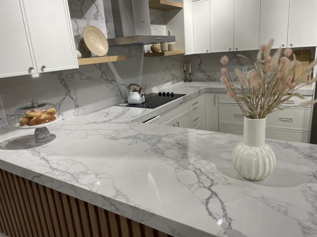 Contractor measuring and installing kitchen countertop