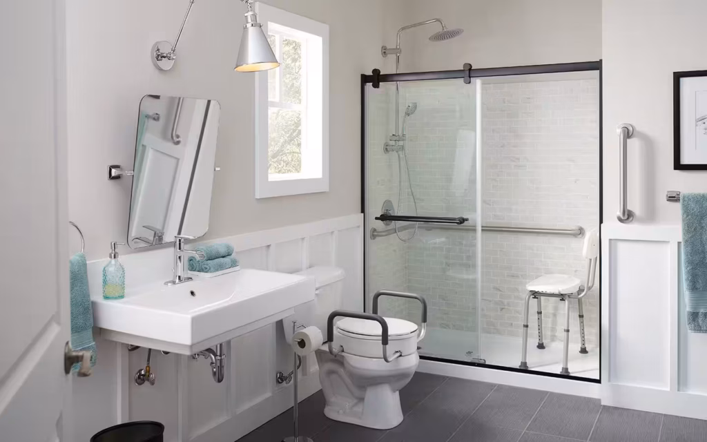 Contractor installing ADA bathroom fixtures
