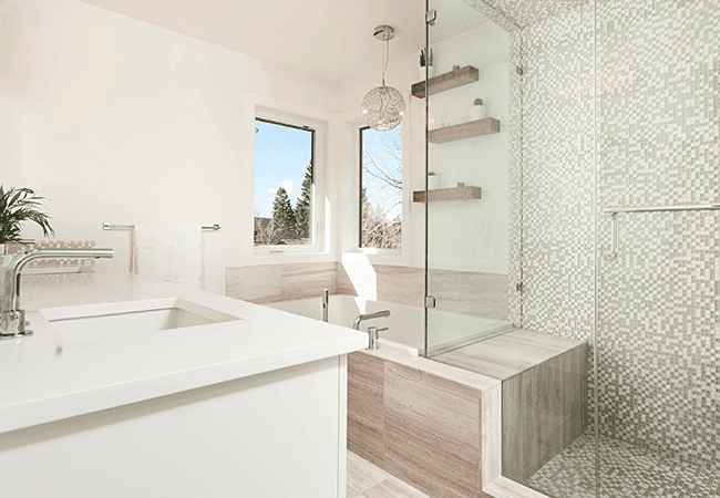 Modern white bathroom with new bathtub in Seattle home