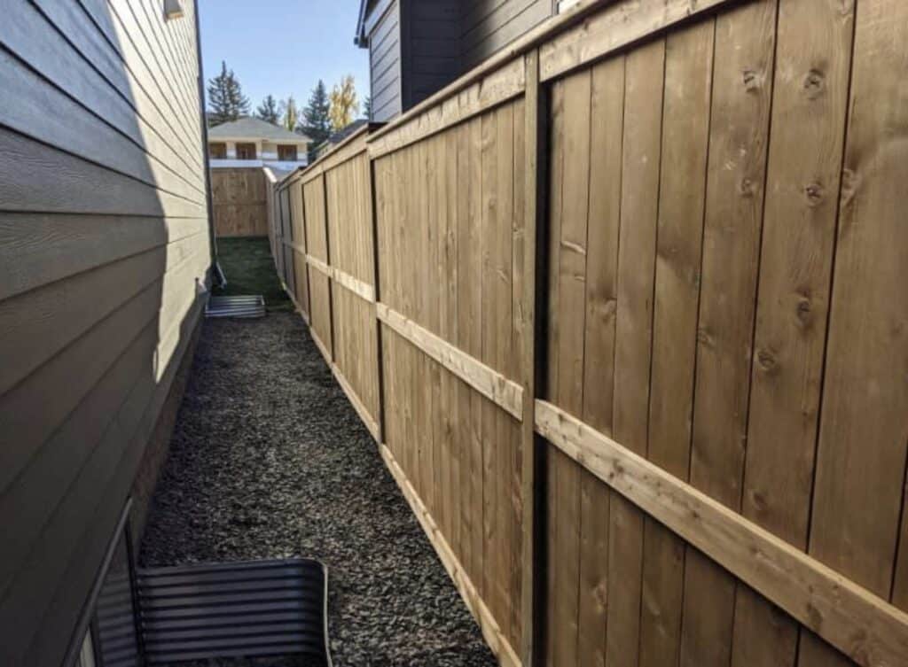 Completed deck project with fence by Cascade Pro Inc